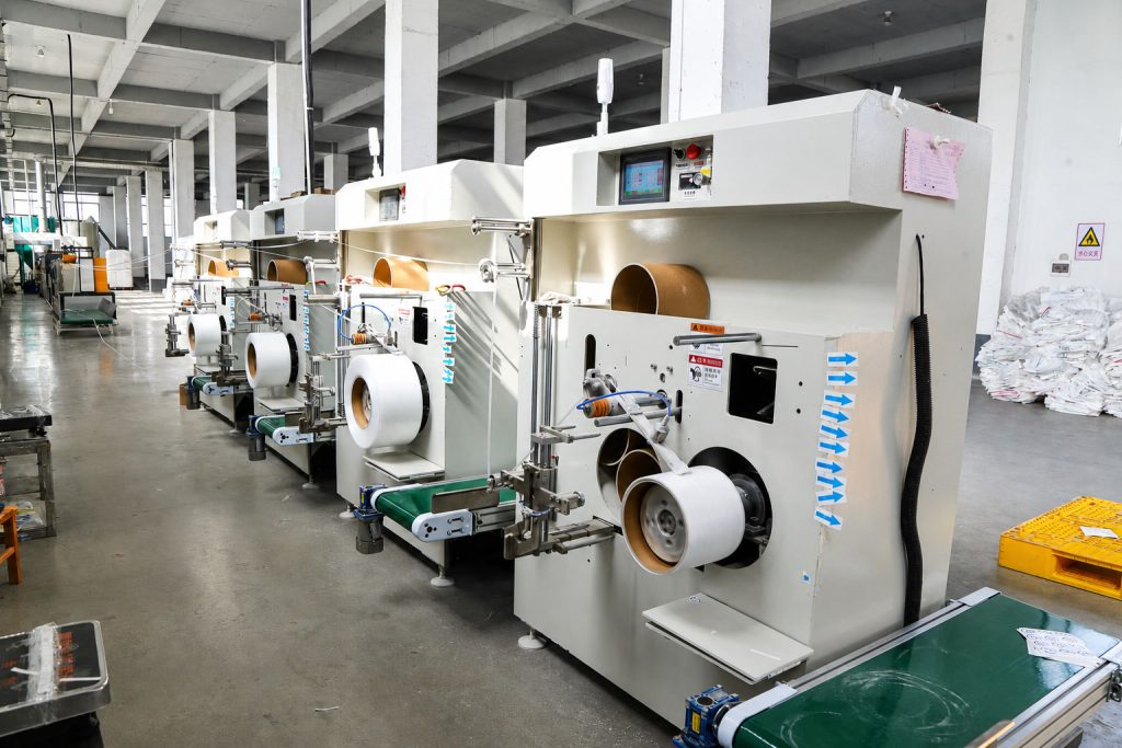 Strapping production line in operation