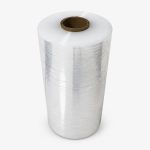 Clear machine stretch film roll on a neutral background